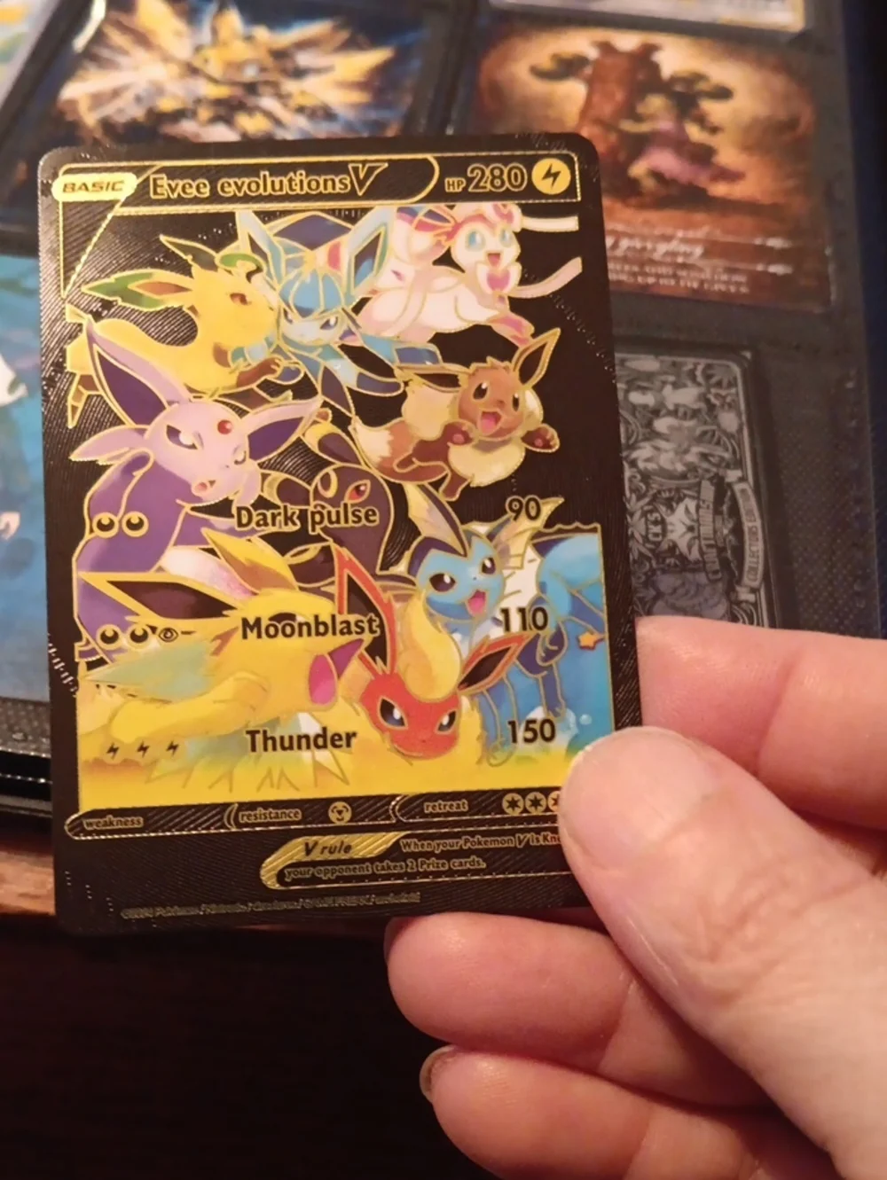 Eevee Evolutions V Holo Pokémon Card - Colorful Gold Foil
